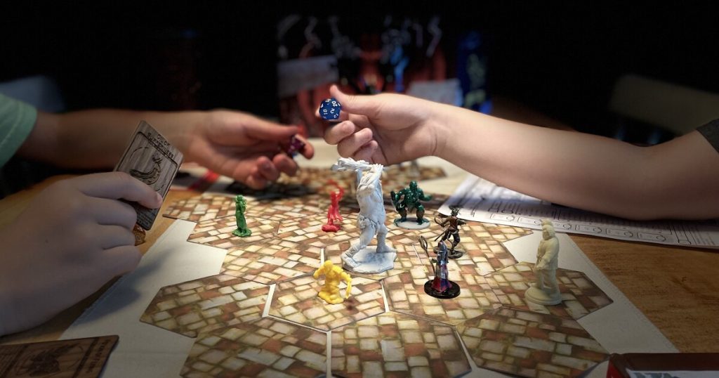 Player Holding Dice for Table Top Role Playing Game